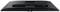 Rückansicht eines Computermonitors mit verschiedenen Anschlussmöglichkeiten, darunter USB- und HDMI-Ports, auf flacher Oberfläche liegend.