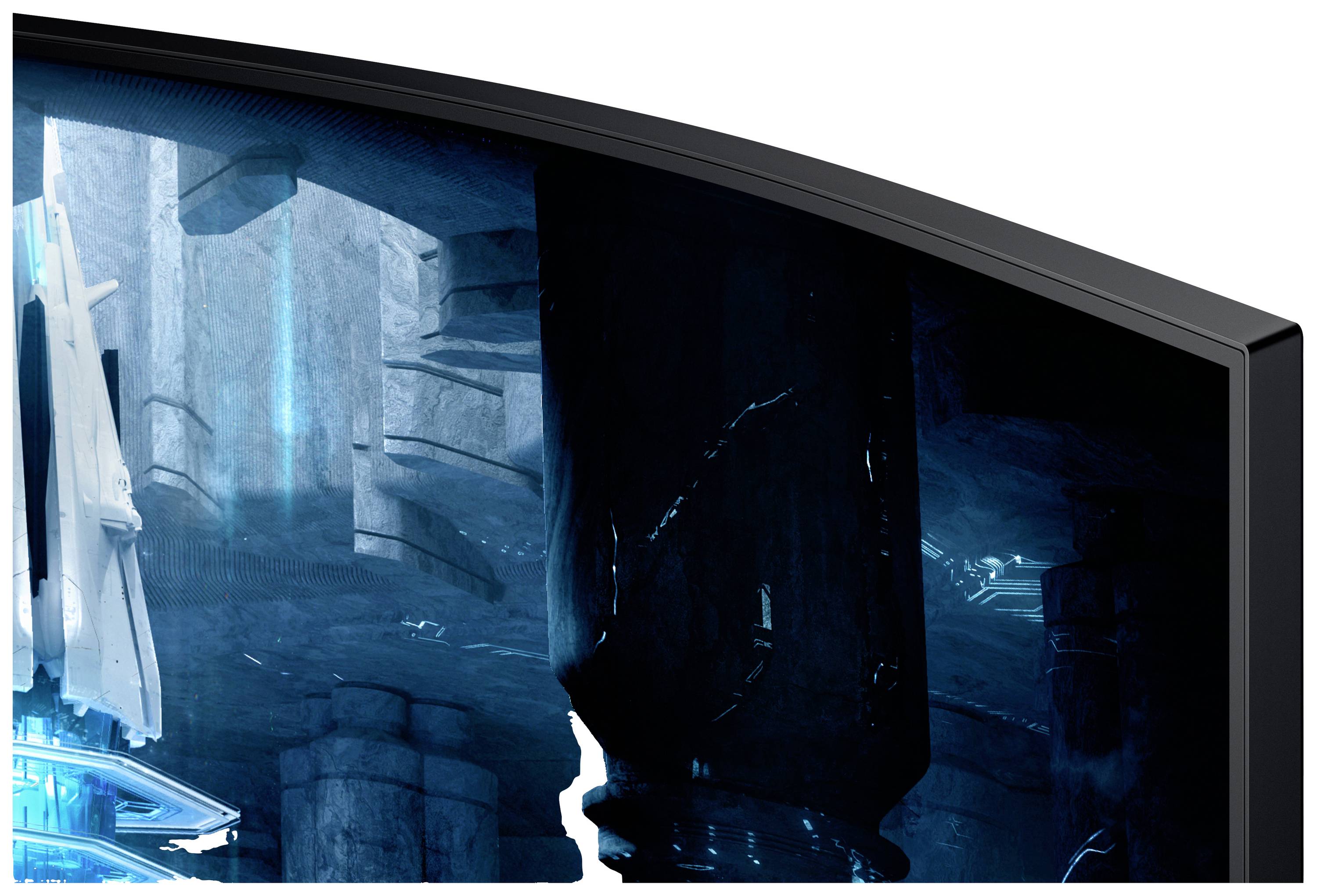 Ein gebogener Bildschirm zeigt eine futuristische, blau leuchtende Szenerie mit metallischen und steinernen Strukturen im Dunkeln.