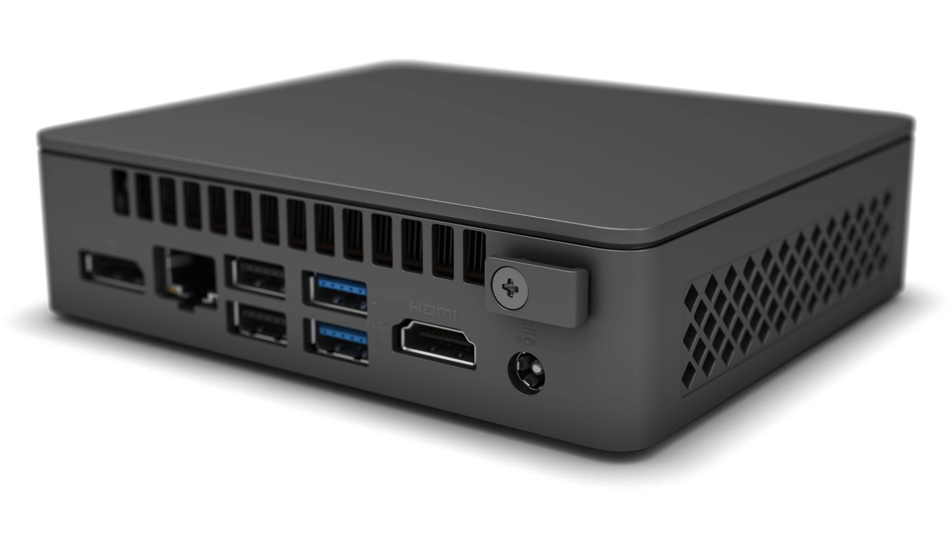 Ein kompakter schwarzer Mini-PC mit mehreren Anschlüssen auf der Rückseite, darunter USB, HDMI und Ethernet-Anschlüsse.