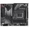 Mainboard mit Beschriftungen 'GIGABYTE' und 'GAMING SERIES'. Sichtbare CPU-Fassung, RAM-Slots, PCIe-Slots und Kühlkörper.