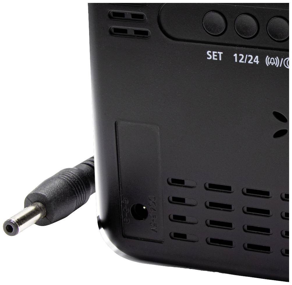 Rückansicht eines elektronischen Geräts mit Netzkabelanschluss und Bedienknöpfen für Einstellungen; zeigt Details der Ventilationsöffnungen.