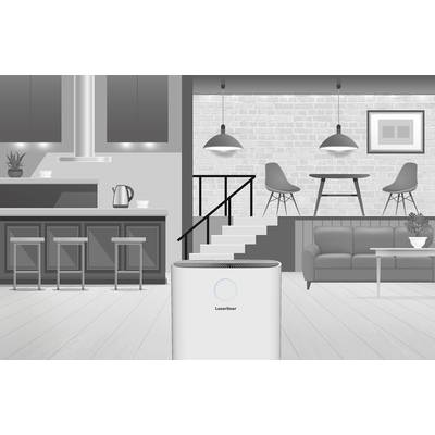 Ein moderner Luftreiniger steht in einem stilvollen Wohnzimmer mit offener Küche. Helle Farben und minimalistisches Design dominieren.