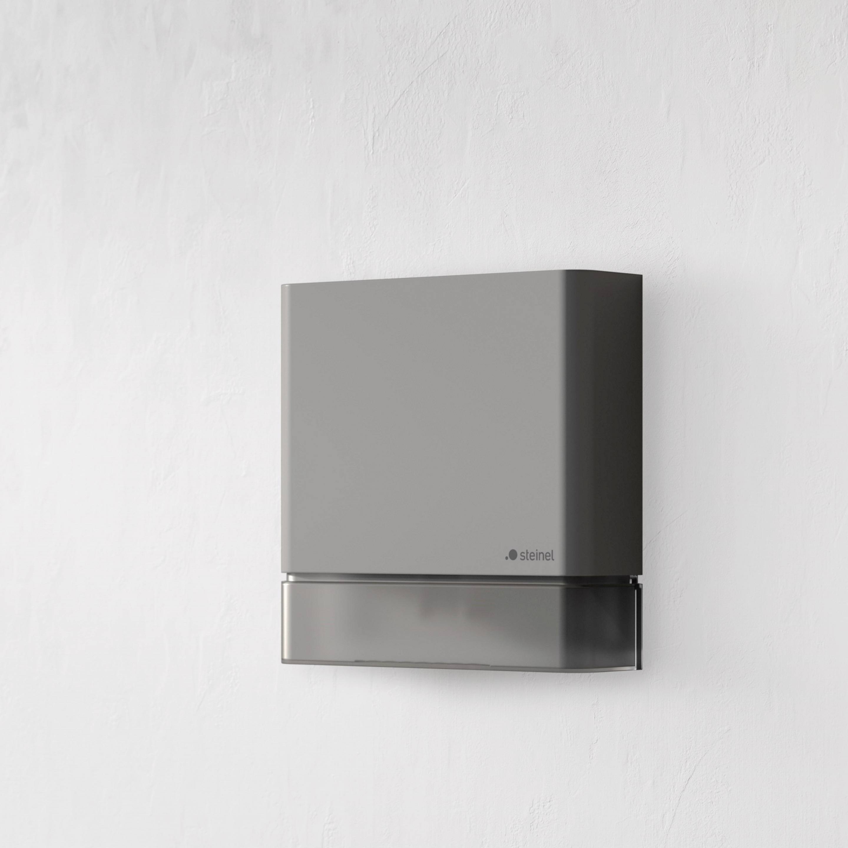 Graues Wandleuchtendesign mit schlichtem, modernem Aussehen, montiert auf einer weißen Wand.