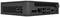Ein kompakter schwarzer Mini-PC mit mehreren Anschlüssen, darunter USB, HDMI, und Ethernet auf der Rückseite. Gerät ist seitlich abgebildet.