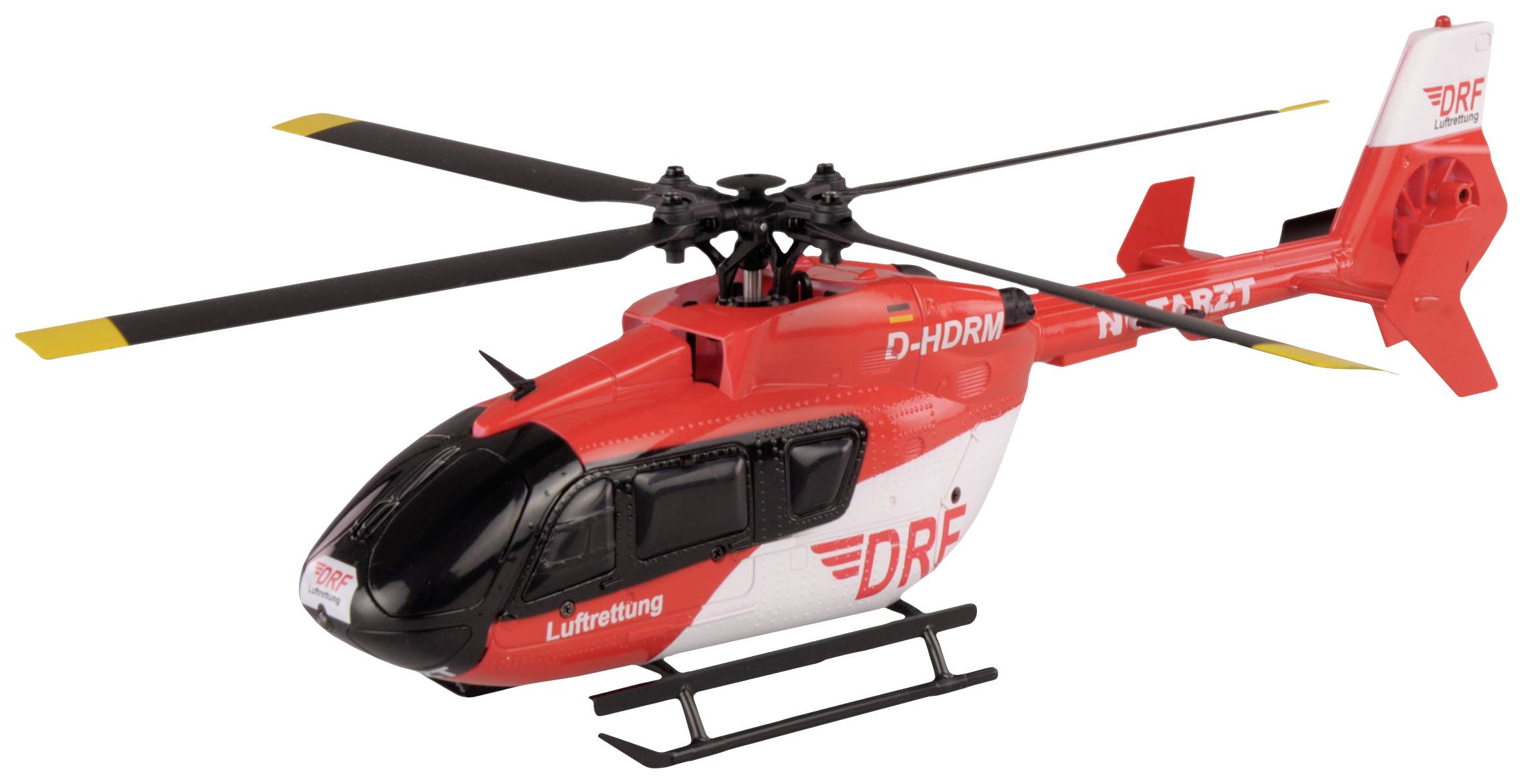 Ein roter und weißer Helikopter der Luftrettung mit der Aufschrift 'DRF' auf der Seite steht bereit für den Einsatz.