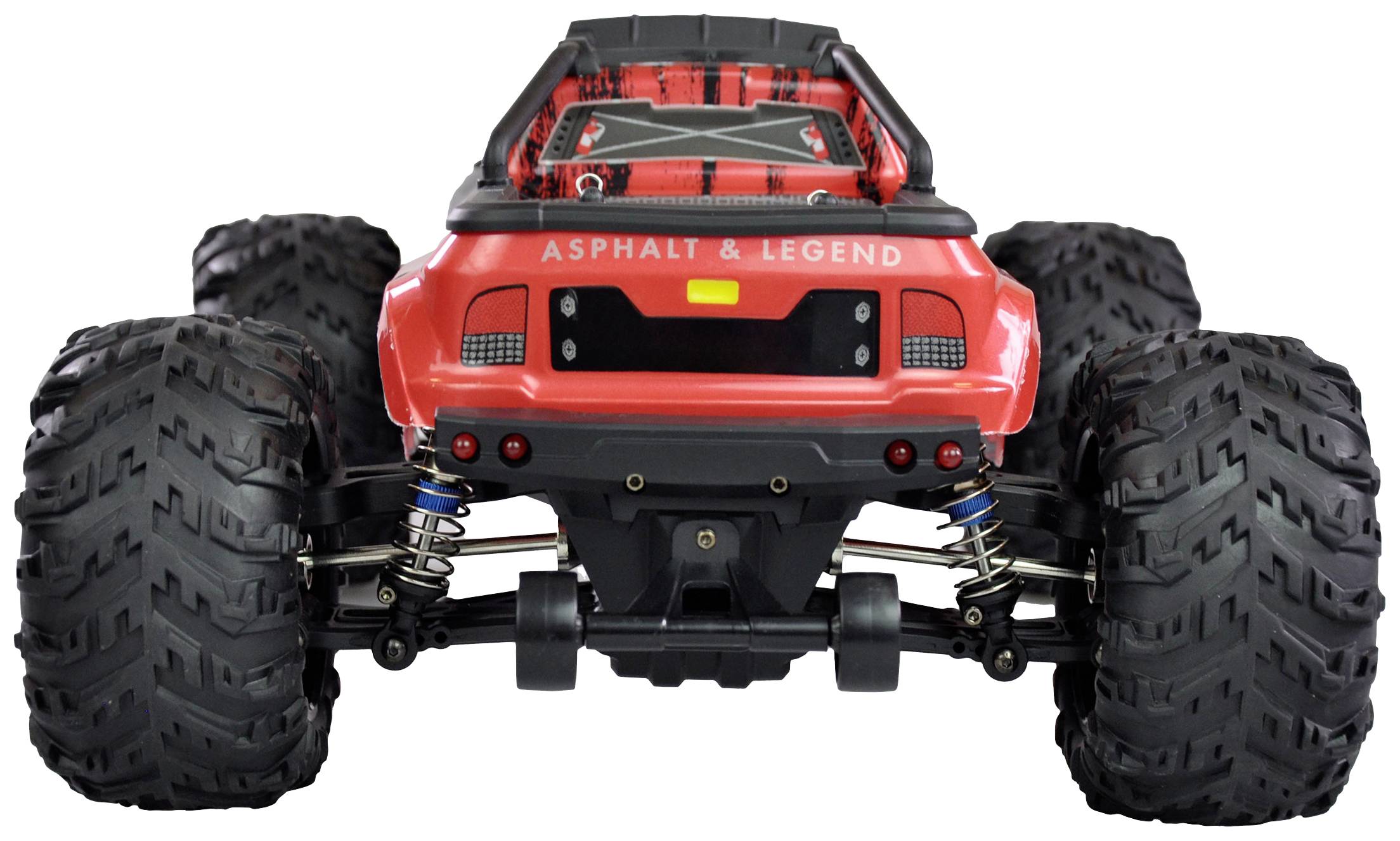 Ein rotes ferngesteuertes Spielzeugauto mit großen, grobstolligen Reifen, von hinten gesehen. Das Auto ist für Offroad-Fahrten geeignet.