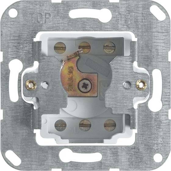Metallrahmen mit zentralem Loch und Schrauben; vermutlich eine Steckdosen- oder Schalterhalterung für den Wandmontageeinsatz.