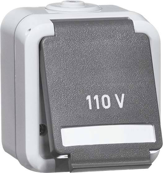 Eine Schutzabdeckung mit der Aufschrift '110 V', die für eine elektrische Steckverbindung verwendet wird.
