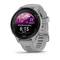 Eine graue Smartwatch zeigt ein Zifferblatt mit rosa Berglandschaft. Der Bildschirm zeigt die Uhrzeit 6:15 und das Datum 23.
