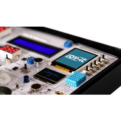 Elektronisches Experimentierboard mit verschiedenen Schaltern, Tasten, LEDs und einem kleinen Display, darauf das Logo 'joy-it'.
