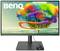 Ein Monitor von BenQ zeigt ein lebhaftes Bild mit einem Baum, umgeben von bunten Wolken, und einer Person, die in der Ferne steht.