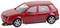 Rotes Modellauto eines VW Golf, seitliche Ansicht, im Maßstab.