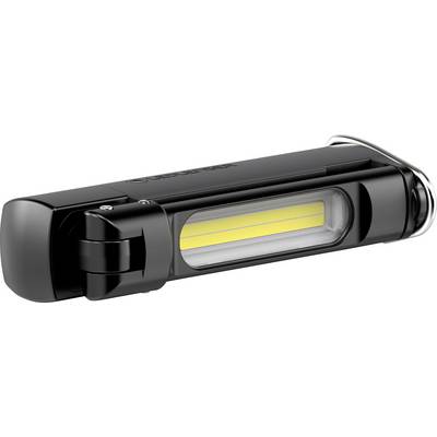 Schwarze LED-Taschenlampe mit gelbem Leuchtstreifen in der Mitte, liegt horizontal auf einer Oberfläche.