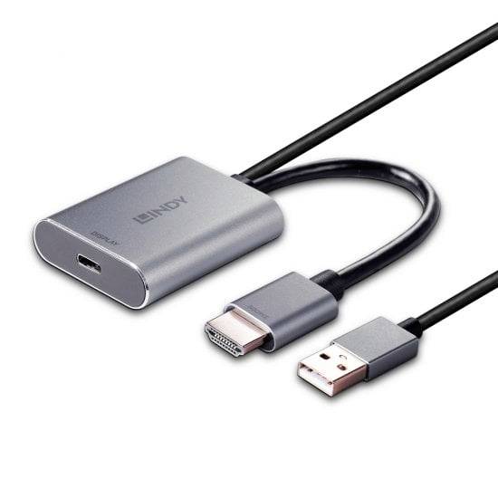 USB-C-zu-HDMI-Adapter mit zusätzlichem USB-Anschluss. Verbunden über kurzes Kabel, in metallischem Gehäuse gestaltet. Ideal zum Verbinden von Geräten.