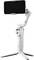 Ein weißer Smartphone-Gimbal mit darauf montiertem Handy, auf einem Stativ stehend, geeignet für stabile Videoaufnahmen und Fotografie.