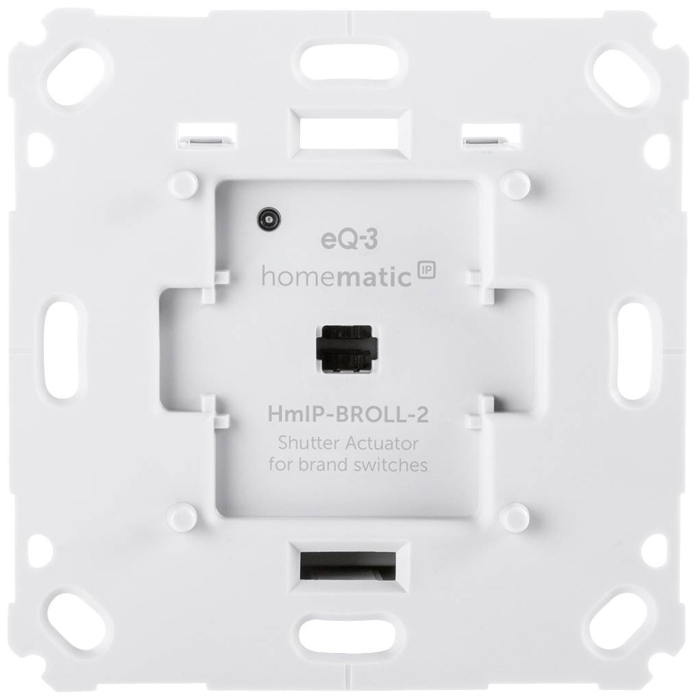 Weiße Homematic IP Rollladenaktor-Platte, zur Steuerung von Rollläden. Quadrat mit zentralem Modul und Montageöffnungen.