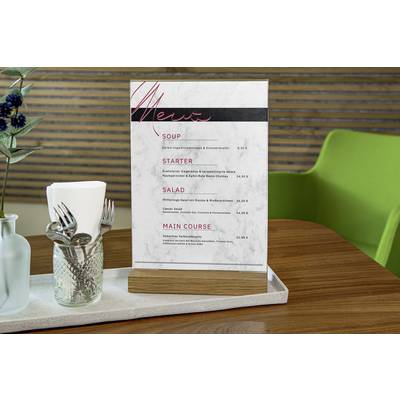 Speisekarte in einem Restaurant auf einem Tisch. Enthält Kategorien wie 'Vorspeise' und 'Hauptgericht' mit Preisen in Euro.
