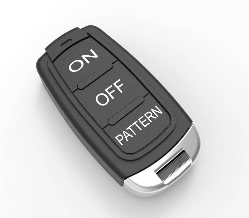 Eine schwarze Fernbedienung mit drei Tasten: 'ON', 'OFF', 'PATTERN'. Sie steuert wahrscheinlich ein elektronisches Gerät.
