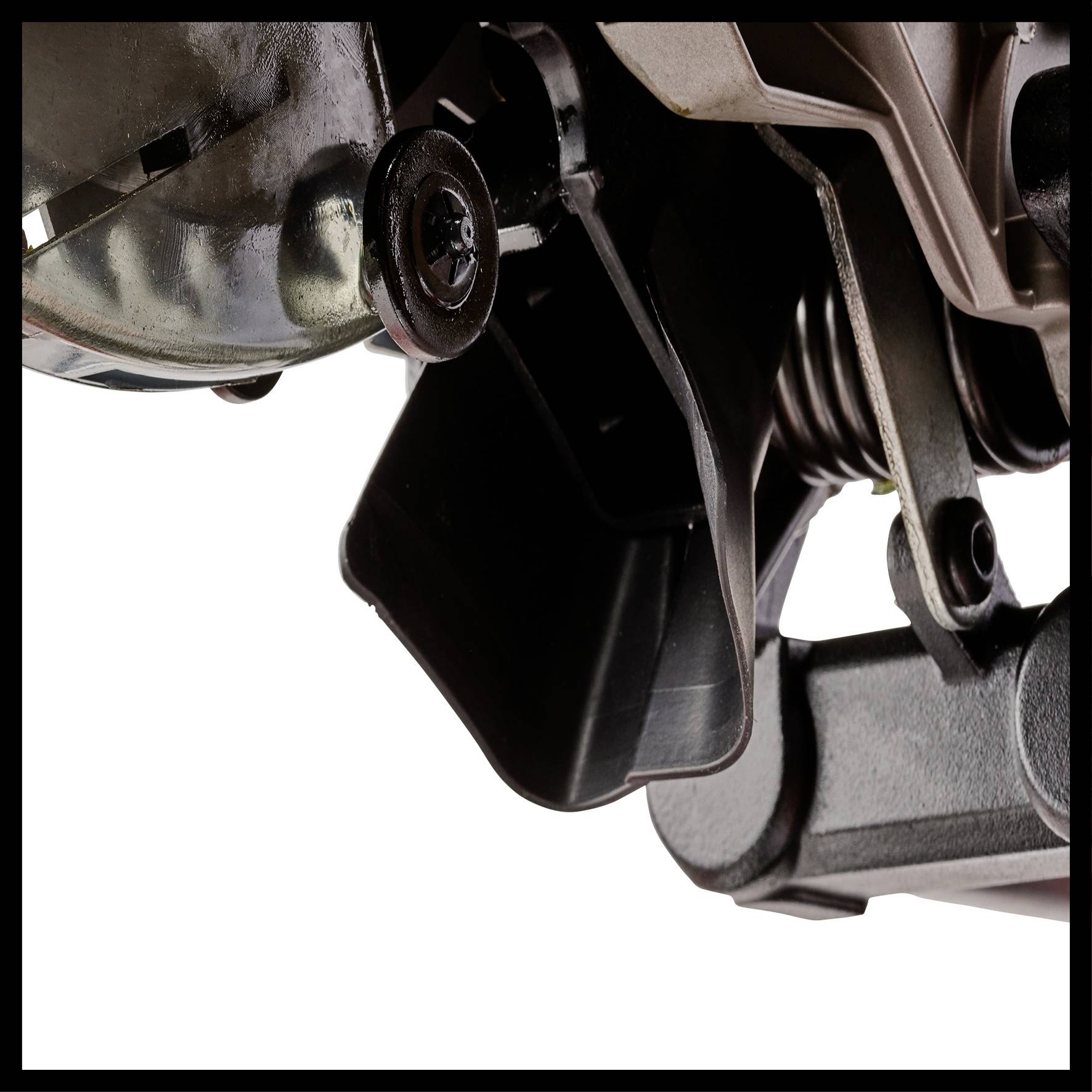 Ein Teil eines Mechanismus, möglicherweise eine Metallverbindung oder ein Maschinenteil, mit Schrauben und Federn.