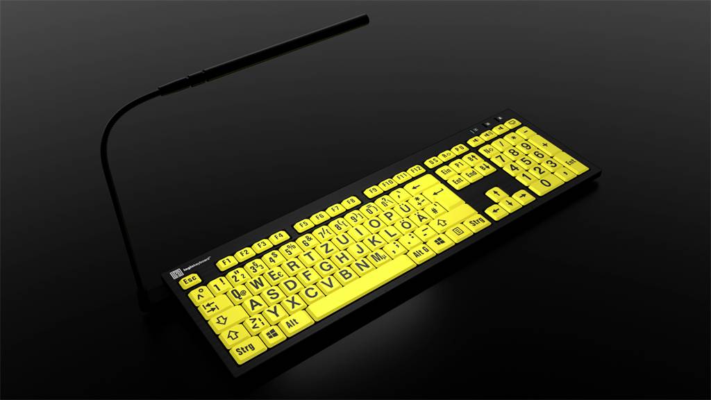 Gelbe leuchtende Tastatur mit großen schwarzen Buchstaben und Zahlen, rechteckiges LED-Licht darüber, auf schwarzem Hintergrund.