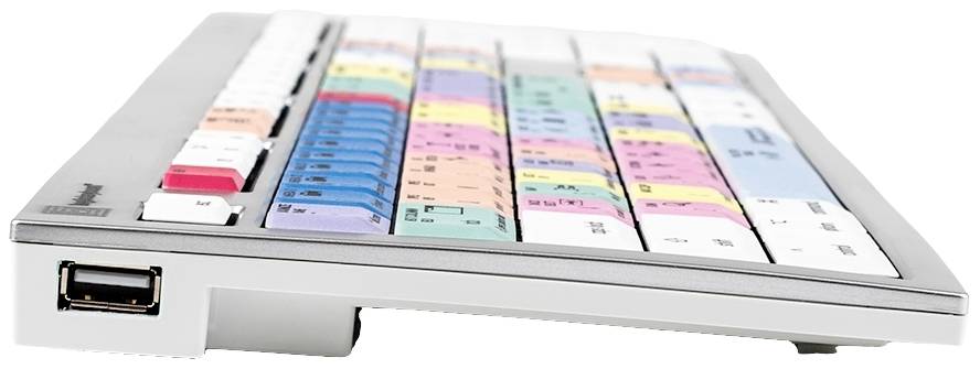 Seitliche Ansicht einer Tastatur mit mehrfarbigen Tasten, die spezialisierte Funktionen für eine Videobearbeitungssoftware kennzeichnen.