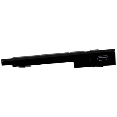 Schwarze Computer-Tastatur in seitlicher Ansicht, die flach auf einer Oberfläche liegt. USB-Anschluss an der rechten Seite sichtbar.