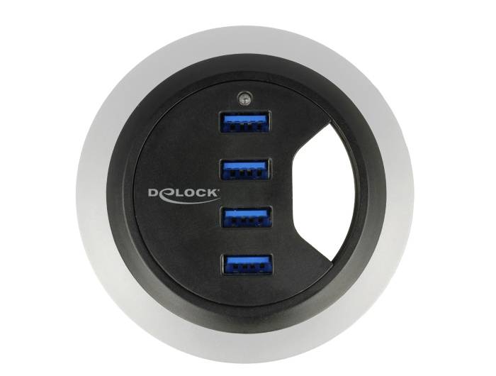 Anschlussfeld mit vier blauen USB-Anschlüssen in einer runden, schwarzen Blende.