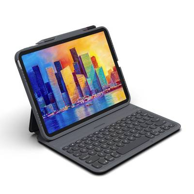 Ein Tablet mit Tastatur zeigt eine digitale Zeichnung von Hochhäusern in lebendigen Farben.