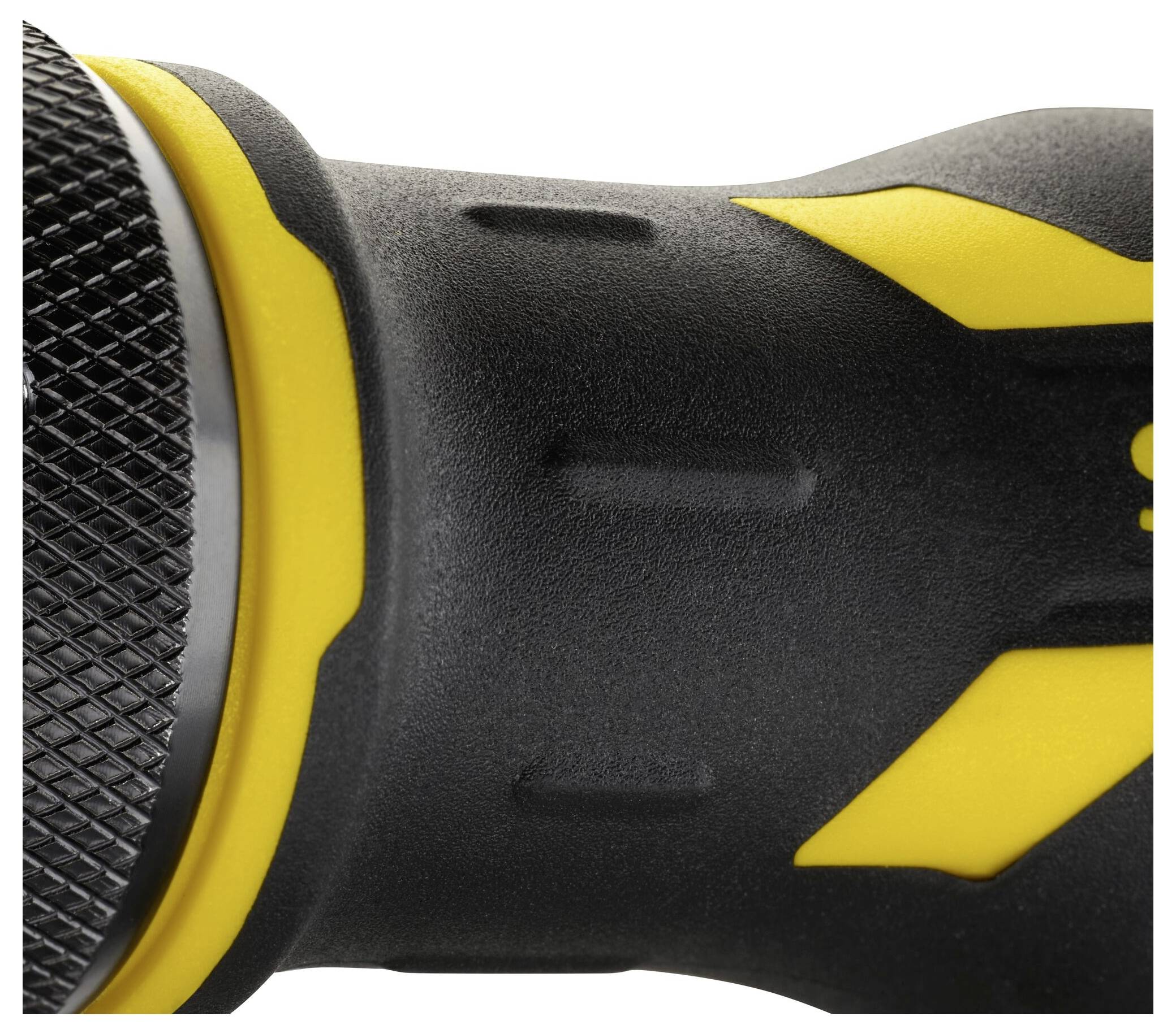 Nahaufnahme eines schwarzen und gelben Werkzeugs mit strukturiertem Griff.