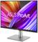'ASUS ProArt' Monitor mit buntem abstraktem Hintergrund auf dem Display. Der Bildschirm steht auf einem starren, silbernen Standfuß.