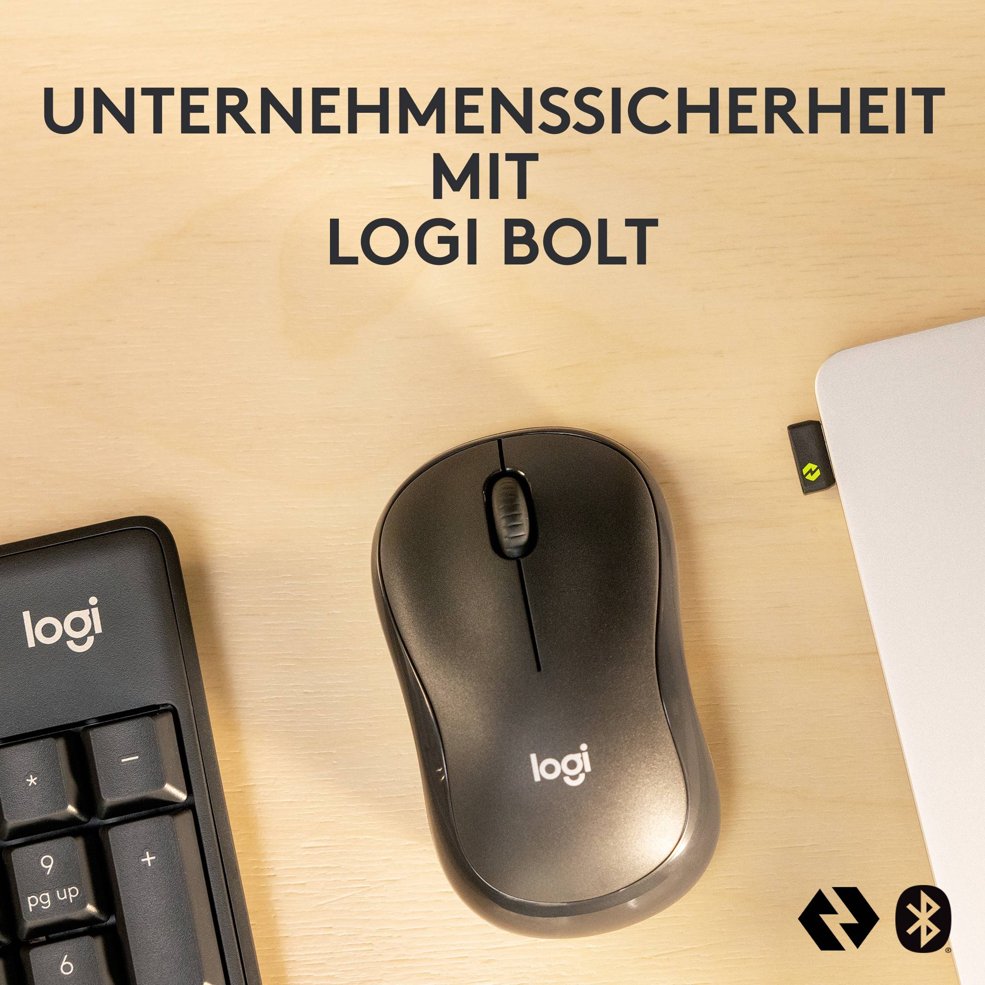 Tastatur, Maus und Laptop mit der Aufschrift 'Unternehmenssicherheit mit Logi Bolt'.