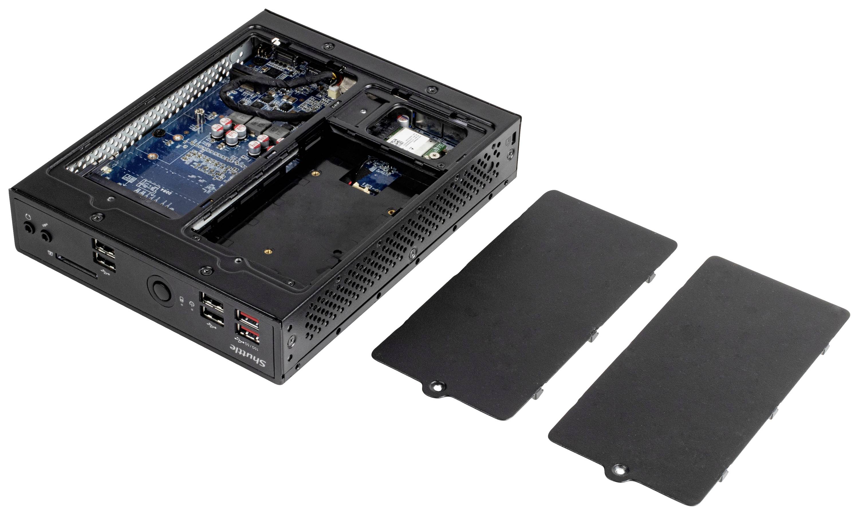 'Schwarzer Mini-PC mit offenem Gehäuse, zeigt Hauptplatine, Kühlkörper und zwei abnehmbare seitliche Abdeckungen.'