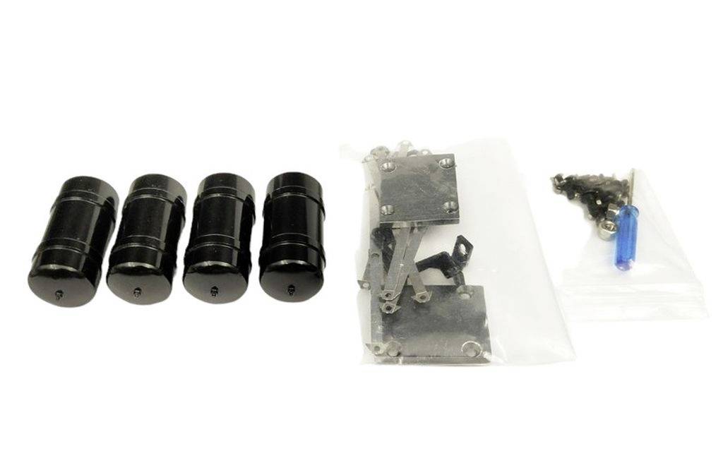 Vier schwarze Zylinder, Metallteile in einem Beutel und Schrauben mit Schraubendreher.