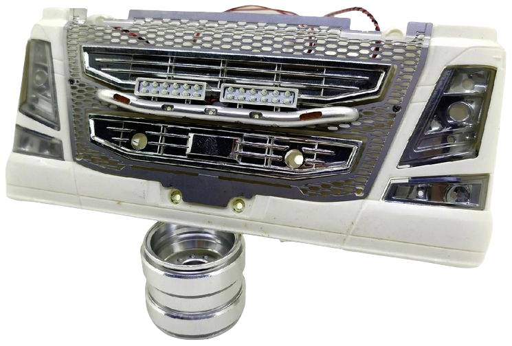 Ein Modell eines LKW-Kühlergrills mit LED-Leuchten und silbernem Standfuß, möglicherweise für Dekoration oder technisches Studium.