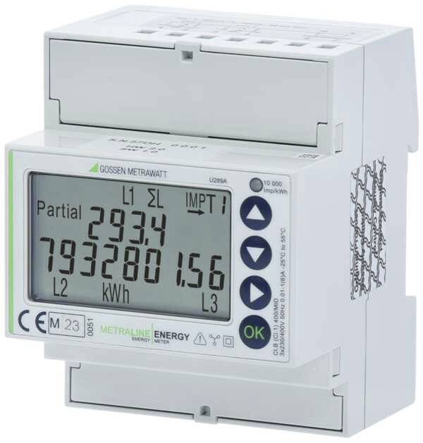 Ein elektronischer Energiezähler zeigt die Werte: '293.4', '79328.0', '1.56'. Er misst den Energieverbrauch in kWh.