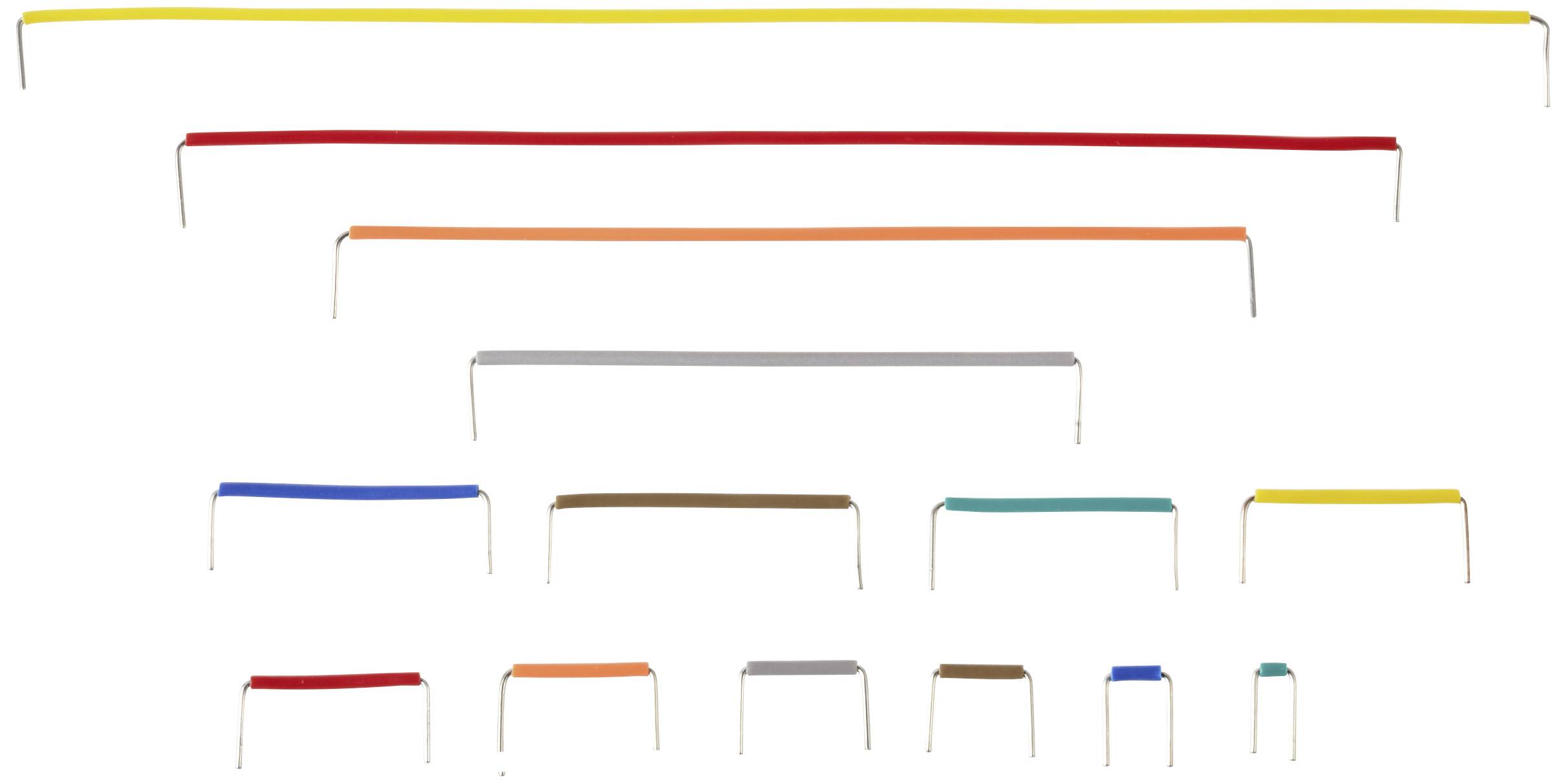 Mehrere bunte Hürden in verschiedenen Größen, geordnet in Reihen. Die Hürden sind in Gelb, Rot, Orange, Grau, Blau und Grün.