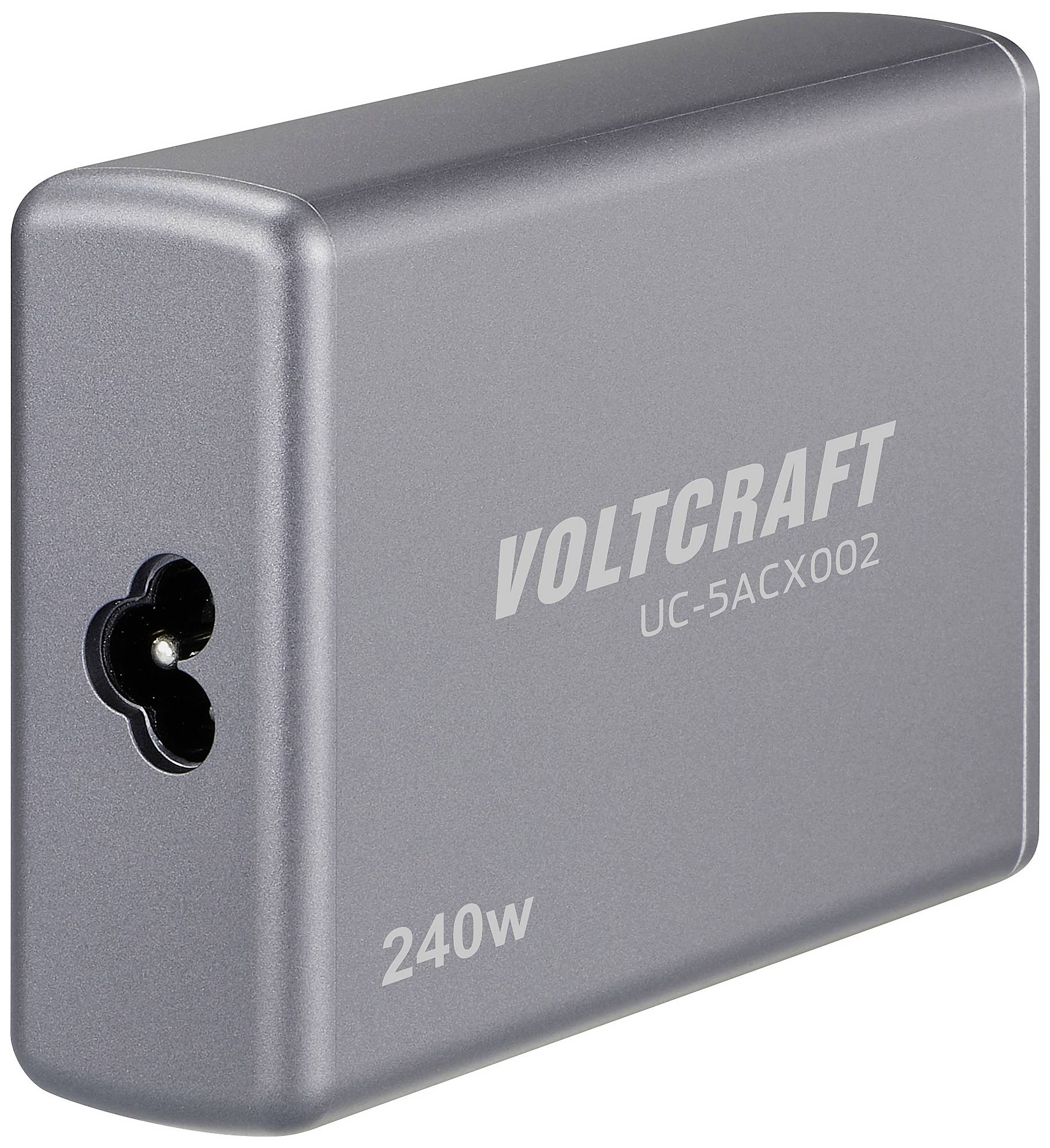 Ein silbernes Ladegerät mit der Aufschrift 'VOLTCRAFT UC-5ACX002 240W'. Es verfügt über einen Anschluss auf der linken Seite.
