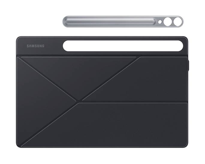 Ein schwarzes Tablet mit diagonalen Linien auf der Rückseite liegt neben einem schmalen grauen Zubehörteil.