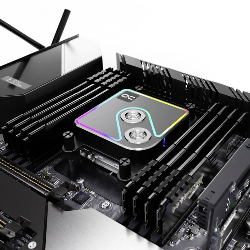 Ein Computer-Motherboard mit beleuchtetem Kühlkörper und mehreren RAM-Steckplätzen, dargestellt in einer Nahaufnahme.