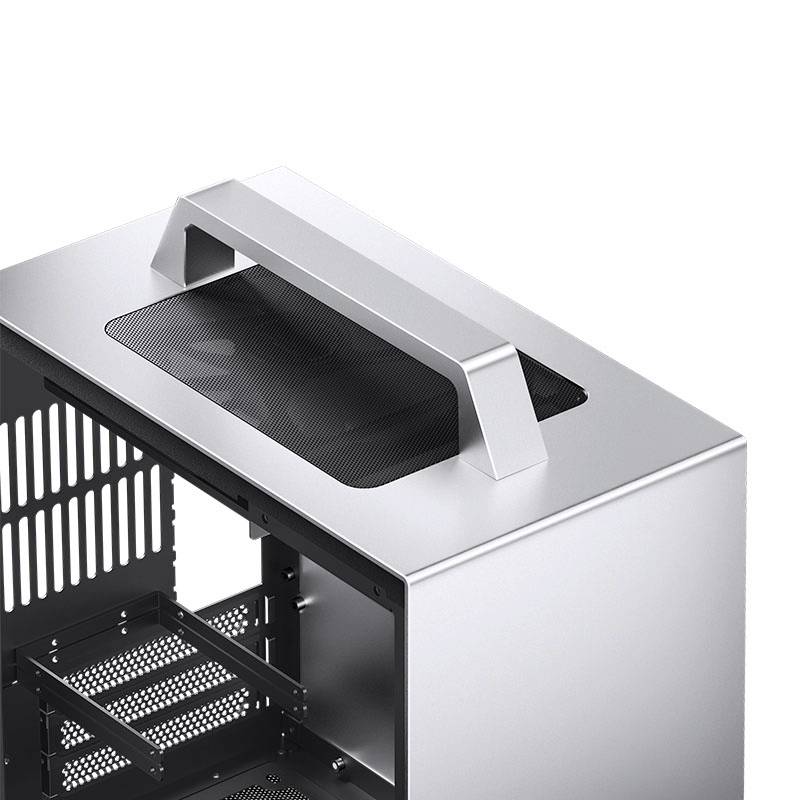 Ein silbernes Computergehäuse mit einem schwarzen Griff oben und seitlichen Lüftungsschlitzen.