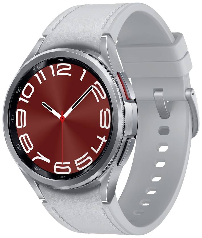 Eine silberne Smartwatch mit einem roten Zifferblatt, großen weißen Nummern und einem grauen Armband.