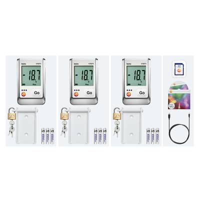 Drei digitale Thermo-Hygrometer mit LCD-Anzeigen zeigen '18,7'. Zubehör: Batterien, Montageset, Schloss, SD-Karte, Kabel.