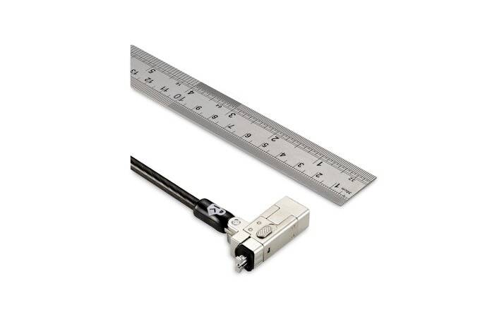 'Ein L-förmiger Metallstecker mit Kabel neben einem Lineal, das Zentimeter und Millimeter zeigt.'