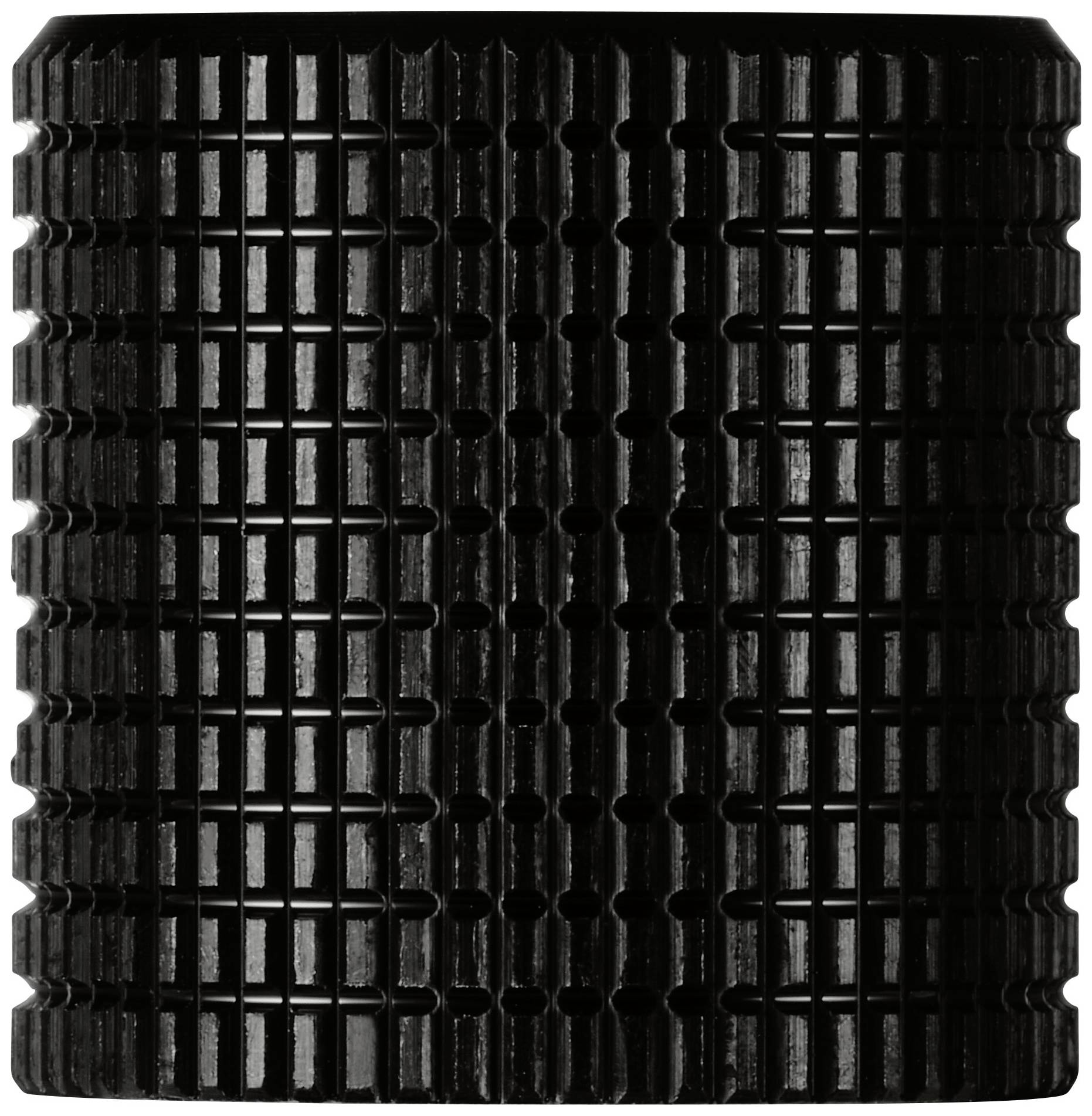 Schwarzer Zylinder mit gerillter Oberfläche, wahrscheinlich Teil eines größeren Mechanismus oder Geräts, strukturiert und symmetrisch.