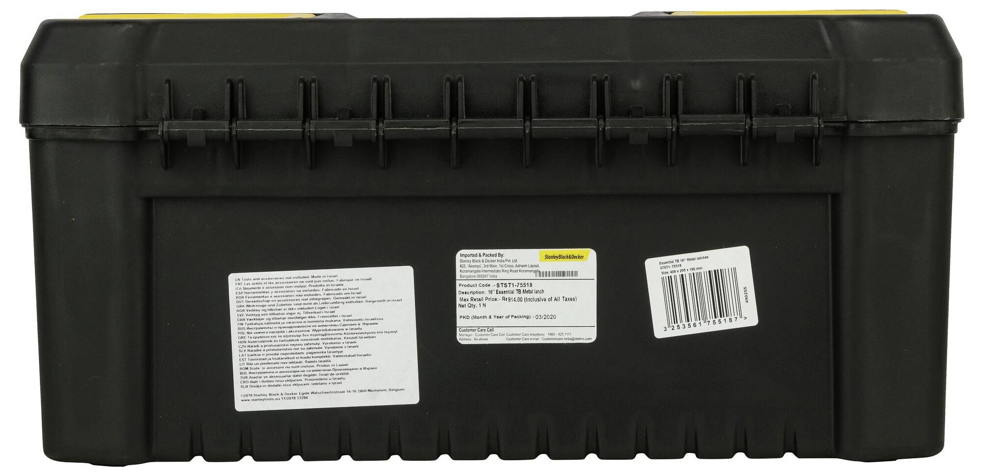 Eine schwarze Werkzeugkiste mit gelbem Griff. Auf der Vorderseite sind zwei Etiketten mit technischen Details und einem Barcodes sichtbar.