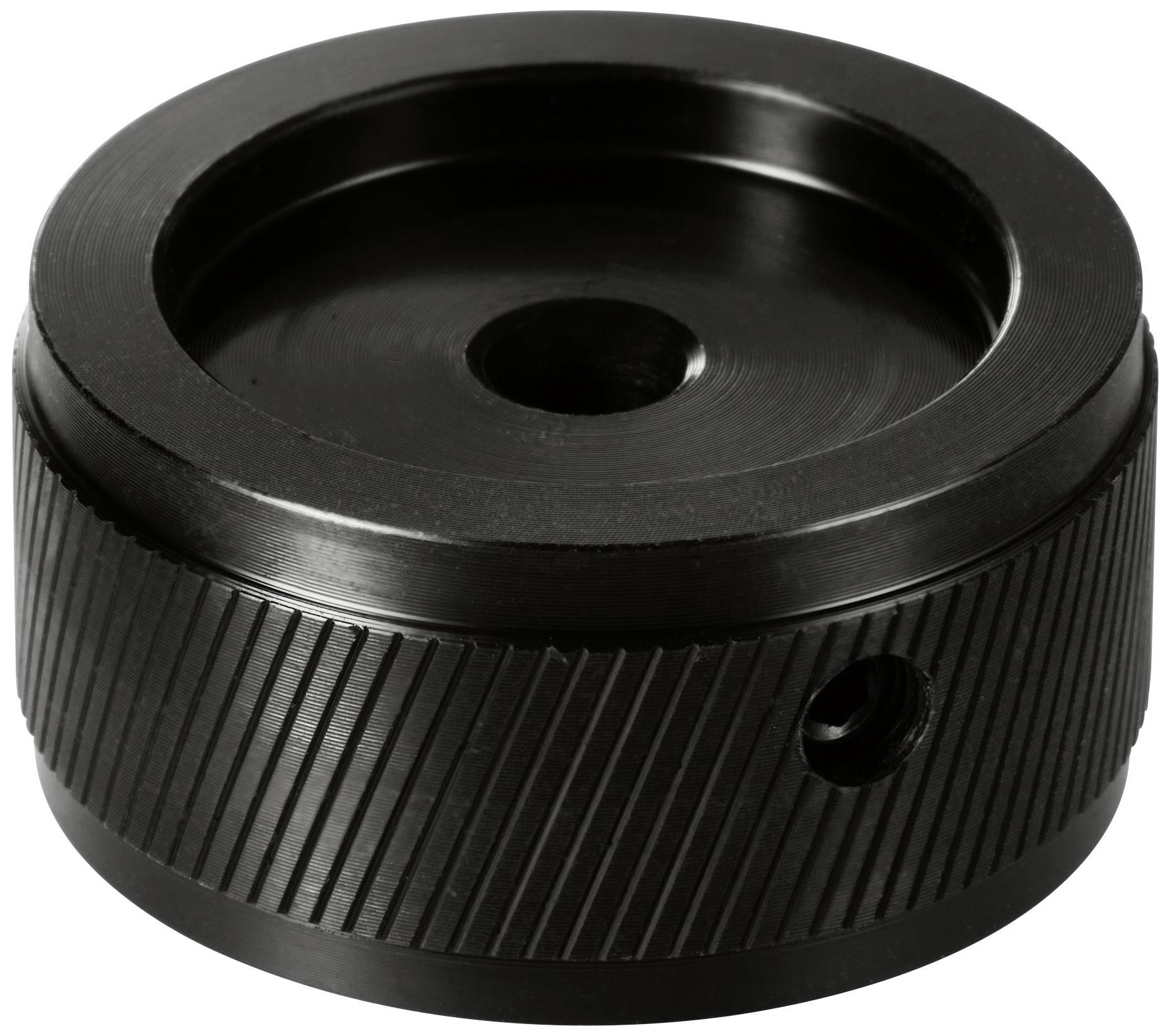 Ein schwarzer, geriffelter Metallknauf mit einer kreisförmigen Vertiefung in der Mitte, möglicherweise Teil eines mechanischen Geräts.