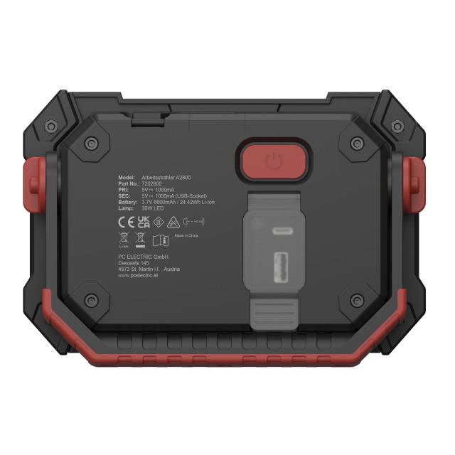 Ein schwarzes tragbares Batteriegehäuse mit rotem Netzschalter und Steckanschlüssen, geeignet für verschiedene elektronische Geräte.