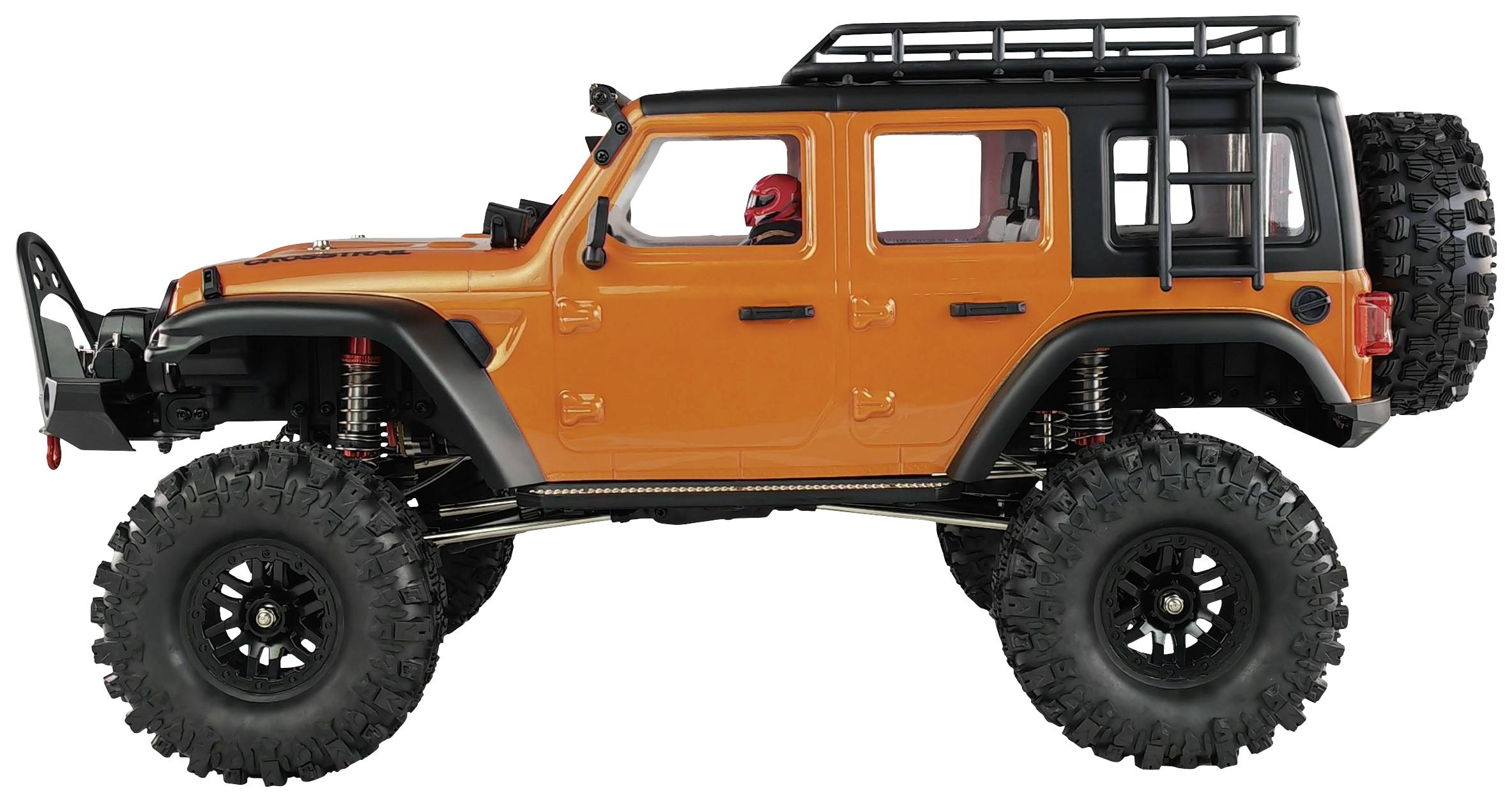 Ein orangefarbener Offroad-Geländewagen mit großem Fahrwerk und schwarzen Felgen, ausgestattet mit Reserverad am Heck.