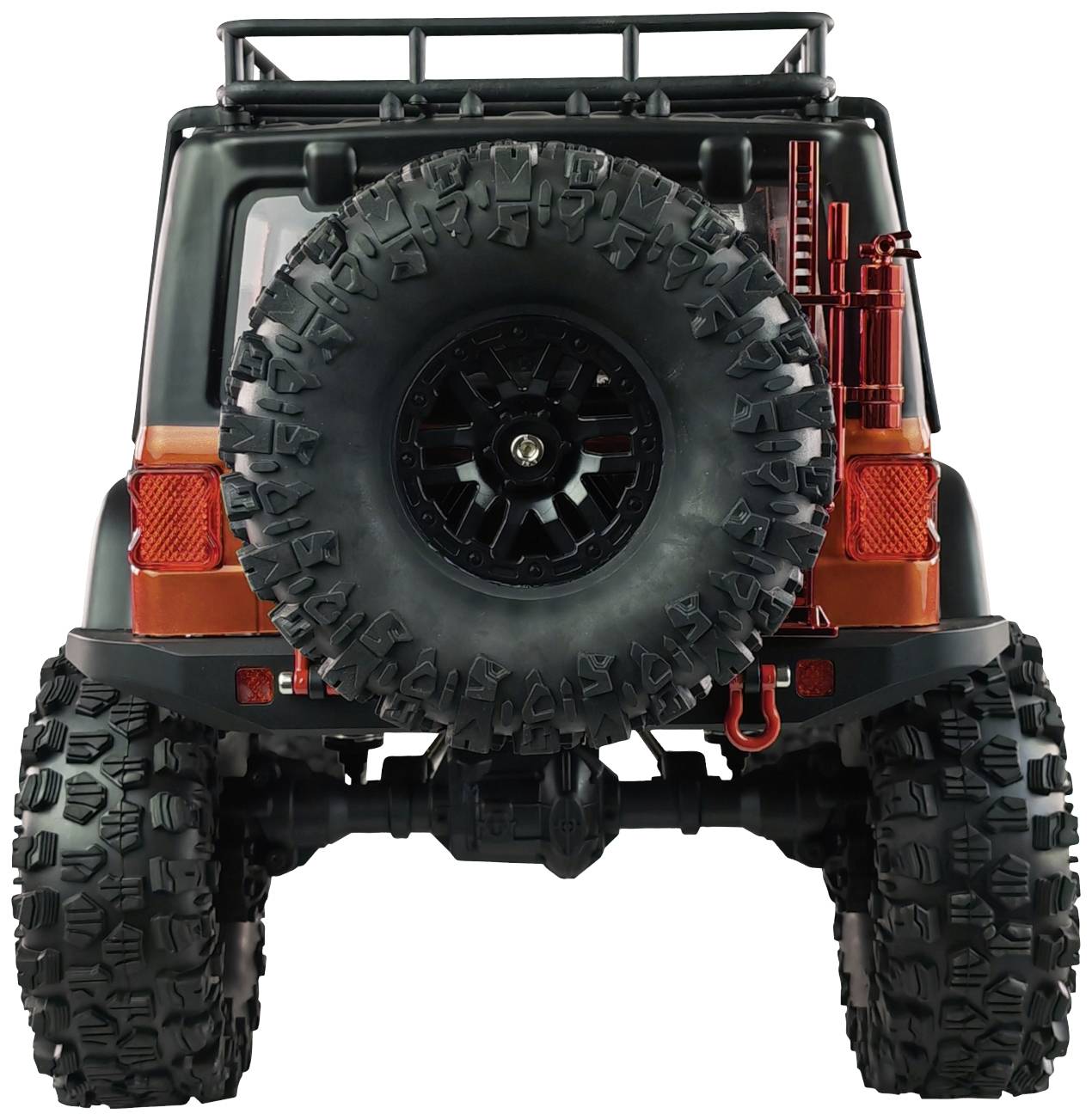 Geländewagen von hinten mit großem Reserverad an der Heckklappe, leuchtend orange Akzente und grobstollige Reifen, bereit für Offroad-Abenteuer.