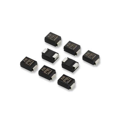 Acht schwarze elektronische Bauteile mit goldenen Markierungen auf einer weißen Oberfläche.